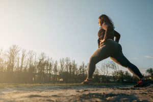 overweight woman starting a workout plan to help with sleep apnea